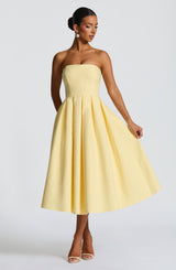 https://cdn.shopify.com/s/files/1/2060/7491/files/edith-midi-dress-lemon-dress-babyboo-fashion-1171050253.jpg?v=1748909423