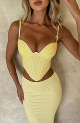 Corsetto alla moda in limone, elegante e femminile