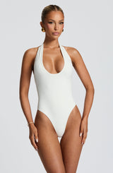 https://cdn.shopify.com/s/files/1/2060/7491/files/odele-bodysuit-white-bodysuits-babyboo-fashion-1161628895.jpg?v=1748396443