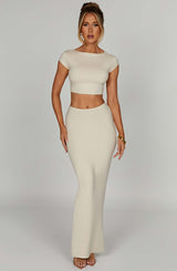 https://cdn.shopify.com/s/files/1/2060/7491/files/yazmin-maxi-skirt-cream-skirt-xs-babyboo-fashion-30807467655231.jpg?v=1748604368